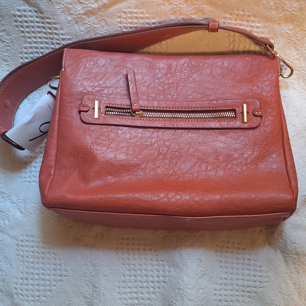 Market & Spruce Orange Crossbody Bag with Modern Design